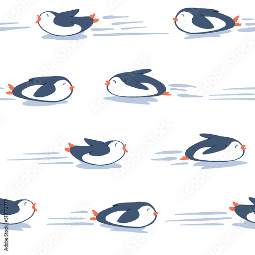 Cute penguins sliding and having fun over the ice in a winter childish cartoon seamless pattern background print. Vector illustration in blue, orange, and white colors. Surface pattern design for kids