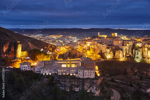 Illuminated picturesque city of Cuenca at dusk. Travel Spain