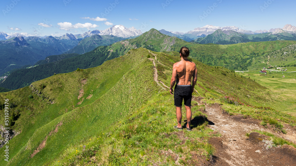 Male hiker enjoying the view in the mountains