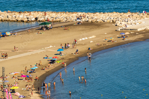 People on the beach with a vintage style. Areal view 