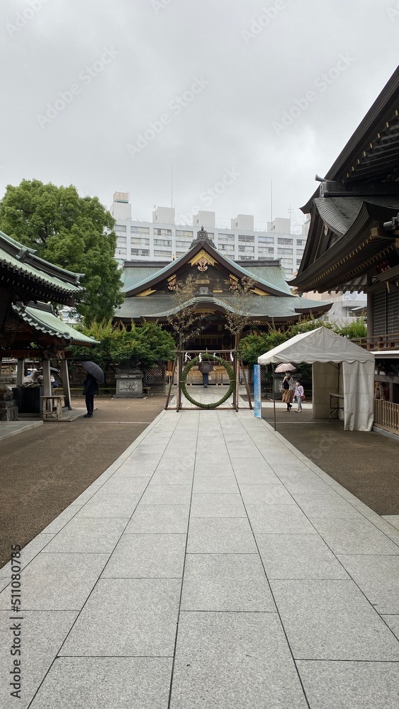 Established in 458, “Yushima Tenmangu” shrine on the days of purification ceremonial month, with the ring of “Chigaya” (plant grass) that we go under as rituals before giving prayers. Photo taken 202 Established in 458, “Yushima Tenmangu” shrine on the days of purification ceremonial month, with the ring of “Chigaya” (plant grass) that we go under as rituals before giving prayers. Photo taken 202