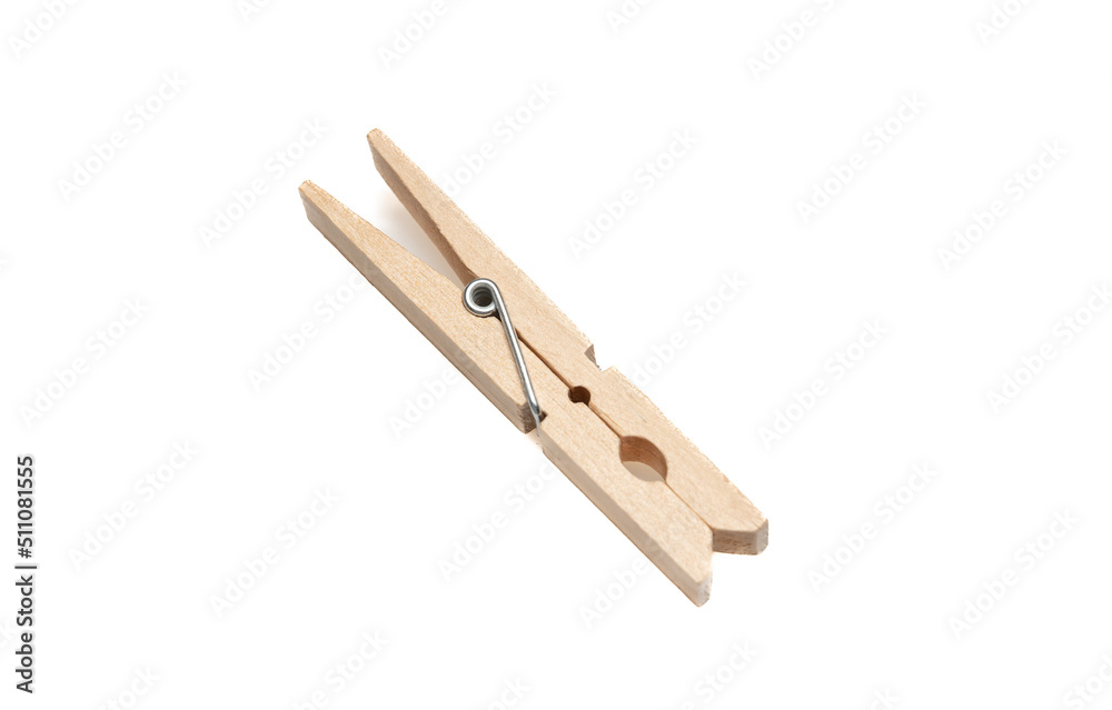 Cloth pin for laundry isolated on white background. Natural color wood clothespin closeup view Cloth pin for laundry isolated on white background. Natural color wood clothespin closeup view
