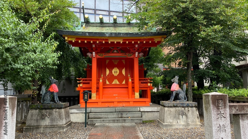 Vivid vibrant pagoda house of Japanese shrine “Kandamyojin”, tiny house in the back ally with fox guardians (messenger of God) enshrined in pairs. Old Shinto family established in 730. 2022/6/15 Vivid vibrant pagoda house of Japanese shrine “Kandamyojin”, tiny house in the back ally with fox guardians (messenger of God) enshrined in pairs. Old Shinto family established in 730. 2022/6/15