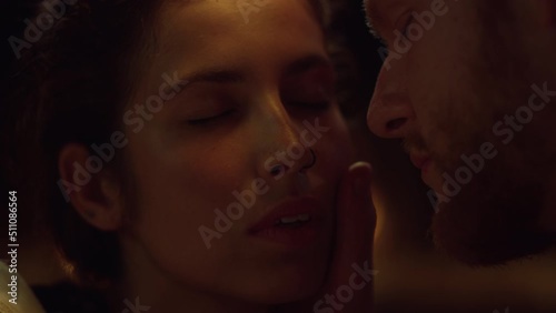 Tender couple desire love on date closeup. Sensual man hand touch woman face