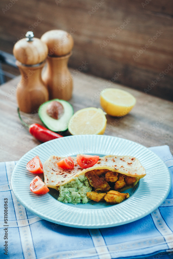 chicken with vegetables. chicken skewers with avocado sauce in pita bread.