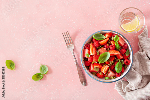 watermelon salad with strawberry raspberry basil seeds. healthy summer dessert