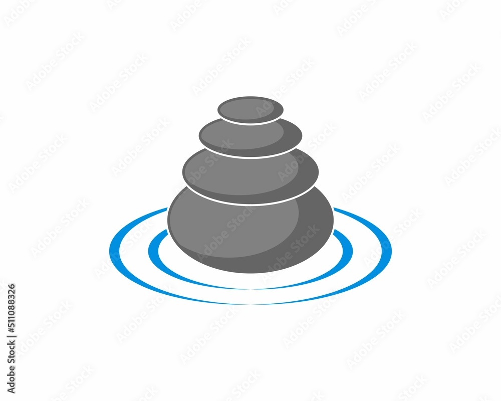 Stacks of stone balance on the water puddle Stacks of stone balance on the water puddle