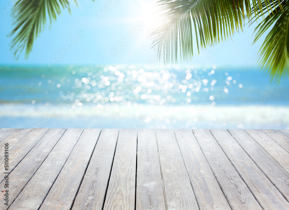 abstract Tropical Sea beach background with white wood panel in the foreground abstract Tropical Sea beach background with white wood panel in the foreground