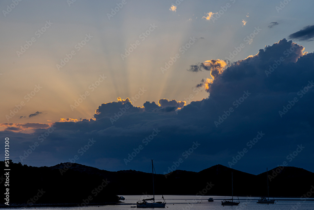 sunset cloudscape in the bay of village Brgulje on island Molat in Croatia