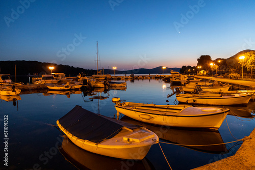 night shot of harbor village Brgulje on island Molat in Croatia photo