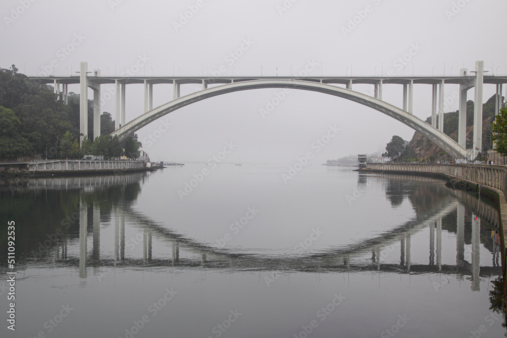 Fototapeta premium Bridge with reflection in the river