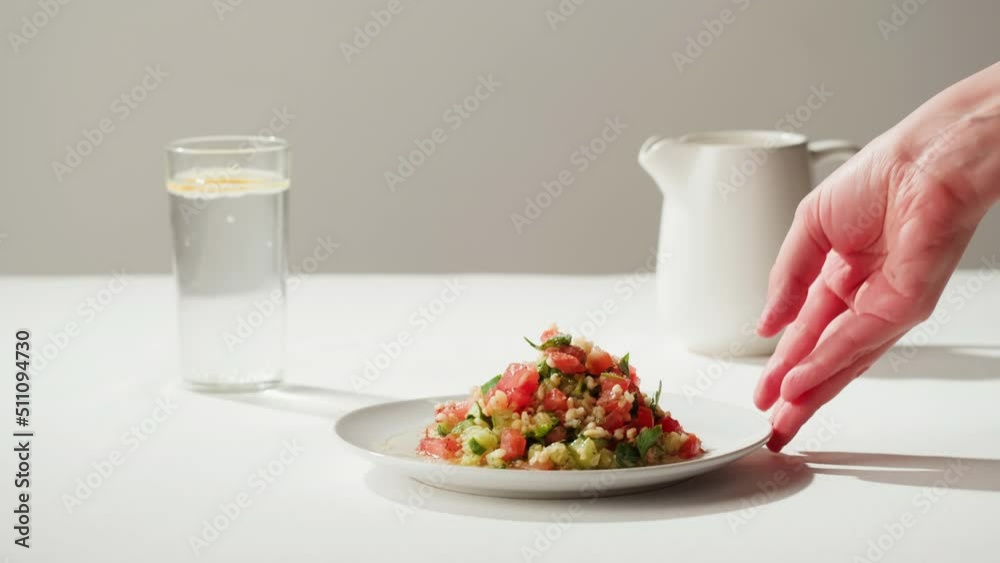 Tabbouleh Vegetable Salad close-up, middle eastern national traditional food. Muslim family dinner, Ramadan, iftar. Arabian cuisine. Tabbouleh Vegetable Salad close-up, middle eastern national traditional food. Muslim family dinner, Ramadan, iftar. Arabian cuisine.