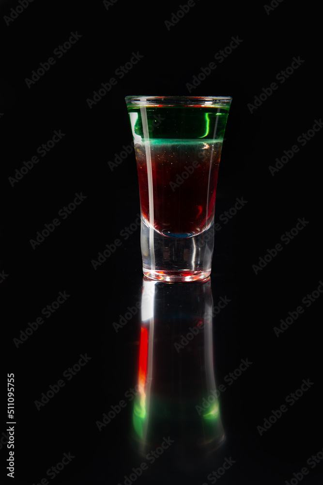Layered cocktail. on a dark background. Layered cocktail. on a dark background.
