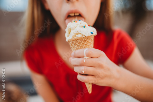 ice cream cone on hot summer day melting