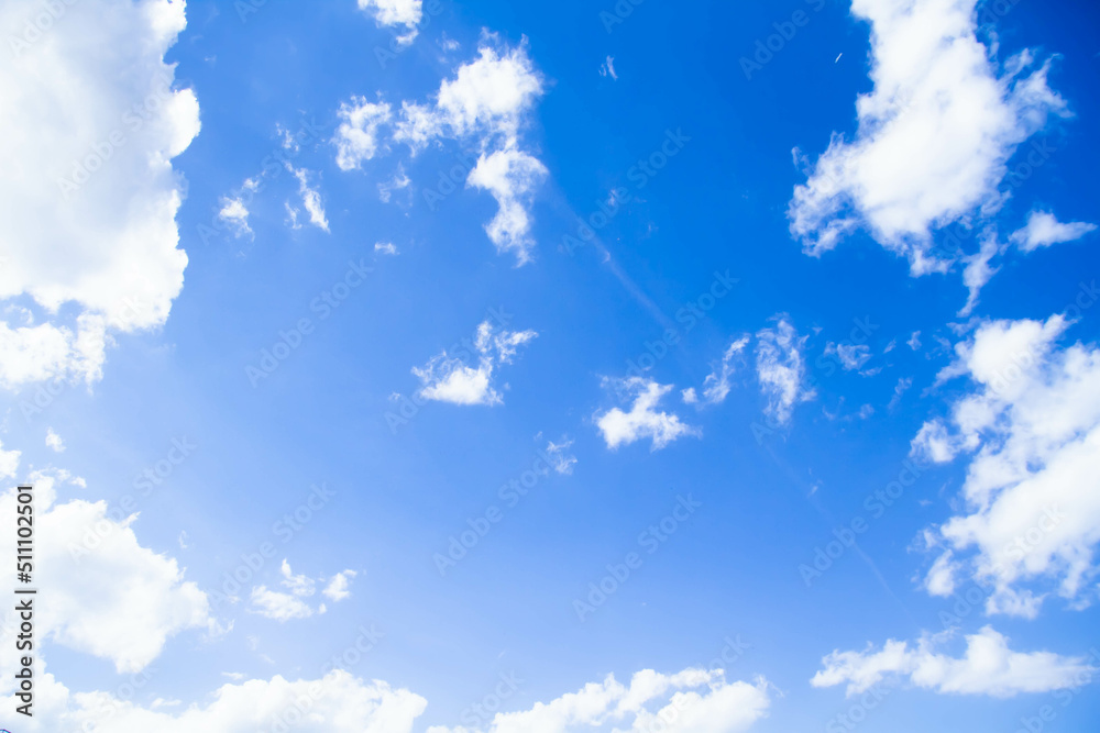Cumulus clouds. White clouds on a blue background. Cumulus clouds. White clouds on a blue background.