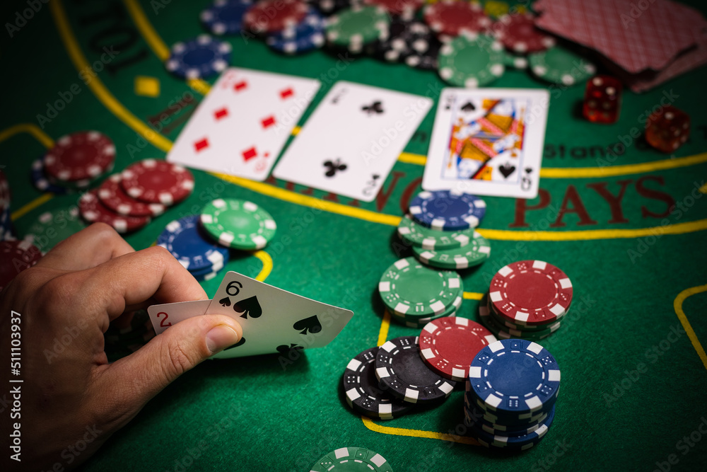 Happy poker player winning and holding cards. Happy poker player winning and holding cards.