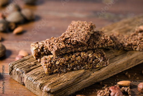 arious healthy granola bars (muesli or cereal bars). Set of energy, sport, breakfast and protein bars. photo