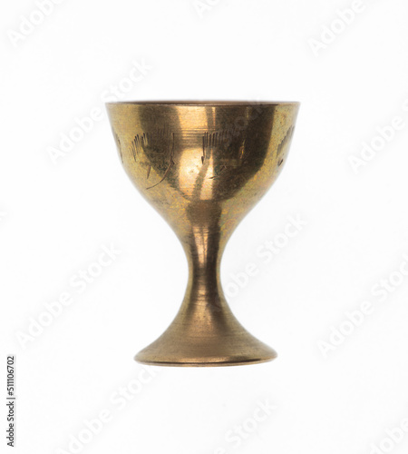 ancient copper goblet for wine on a white background