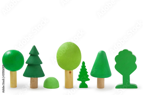Row with wooden trees isolated on white background