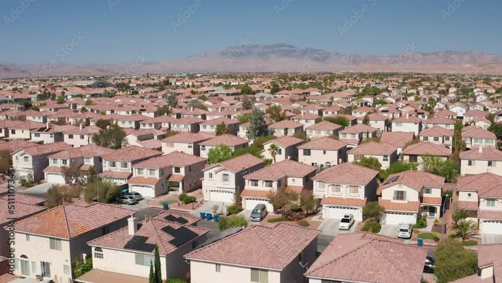 Sideways shot of cute Las Vegas suburban houses with Mount Potosi in background Sideways shot of cute Las Vegas suburban houses with Mount Potosi in background