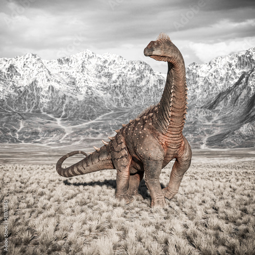 alamosaurus is walking in the plains and mountains cool view photo