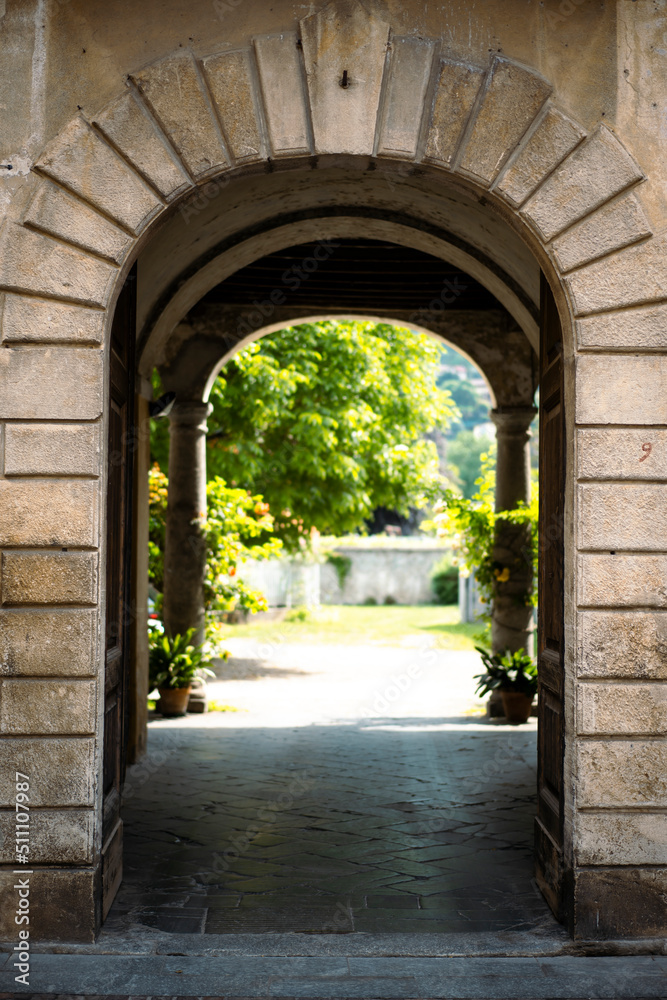 Fototapeta premium Arched passage in an old town