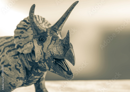 triceratops on snow background close up with copy space