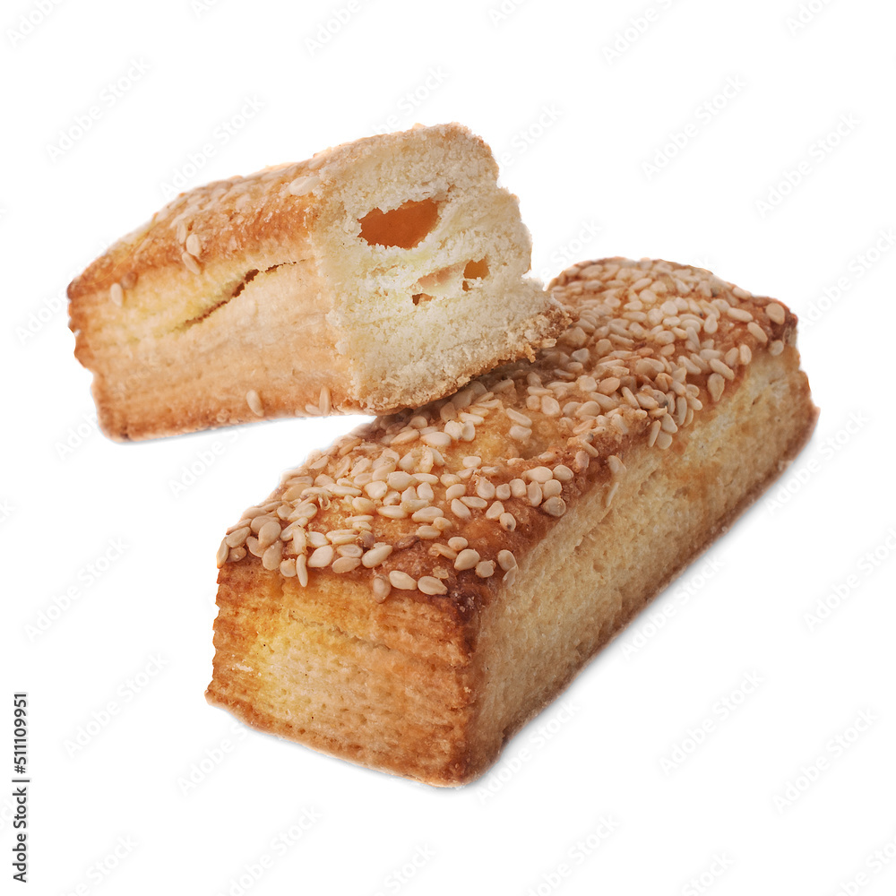 puff pastry with sesame seeds whole and cut on white background isolated puff pastry with sesame seeds whole and cut on white background isolated