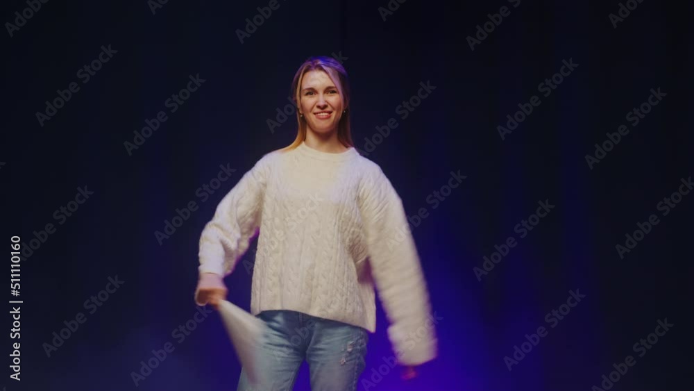 Talent contest. Woman telling jokes on stage. Female comedian speaking with audience, humorous monologue. 