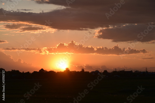 Beautiful golden evening sunset with pink clouds