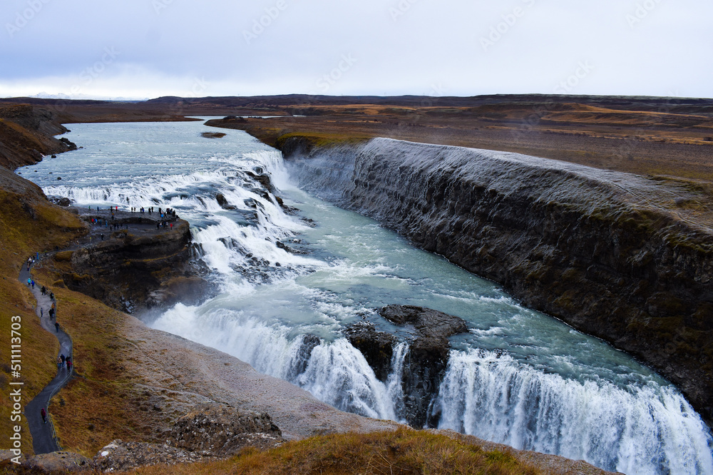 Panoramic shot of Gullfoss waterfalls, the Golden Falls of Iceland. One of Iceland's most iconic places Panoramic shot of Gullfoss waterfalls, the Golden Falls of Iceland. One of Iceland's most iconic places