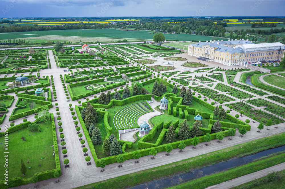 Aerial view on baroque garden of Rundale palace in summer time. Symmetrical park in vibrant green colors. - obrazy, fototapety, plakaty 