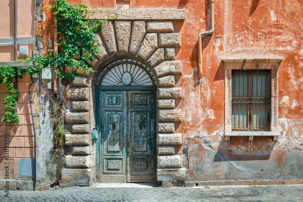 Historic house in a street of The Trastevere city district in Rome Historic house in a street of The Trastevere city district in Rome