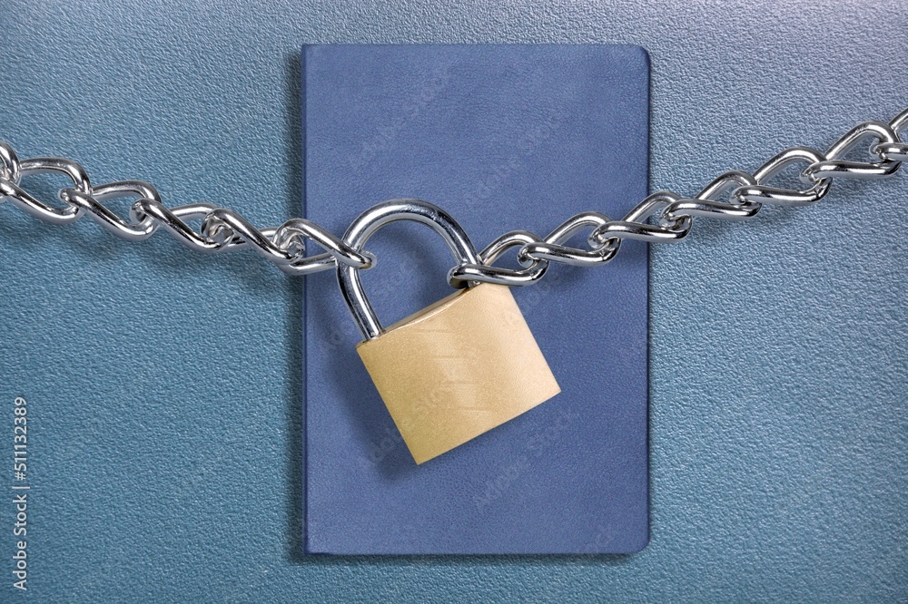 The book is locked under lock. Secret archive. Chain on the book of secrets is under lock and key. The book is locked under lock. Secret archive. Chain on the book of secrets is under lock and key.