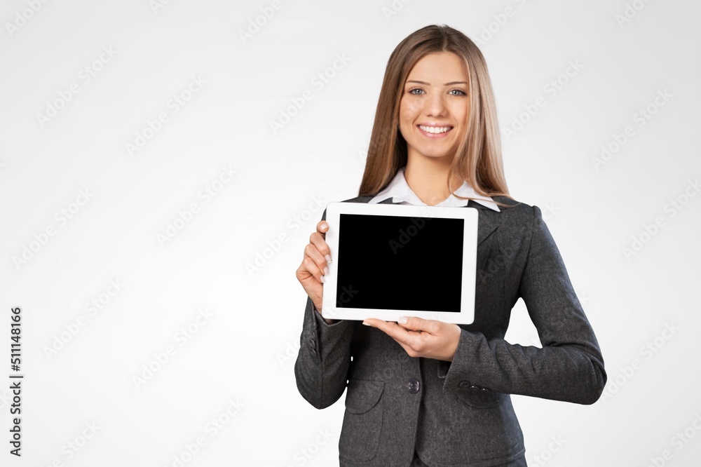 Image of young woman, company worker, smiling , standing over background Image of young woman, company worker, smiling , standing over background