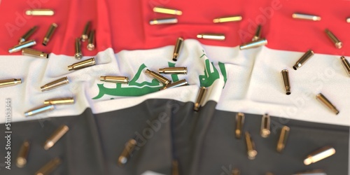 Flag of Iraq and bullet shells. Crime or war related 3D rendering