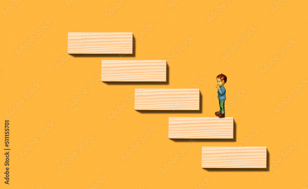 Fototapeta premium Man climbs up the career ladder. Business concept