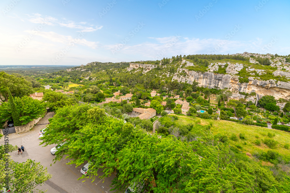 View of the valley and Alpilles Mountains from a terrace at the medieval stone and rock village of Les Baux-de-Provence near the Cote d'Azur region of Southern France.