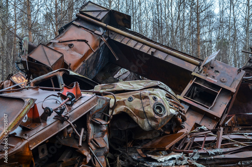 Piles of old rusty soviet crushed trucks in scrap metal yard. Car recycling