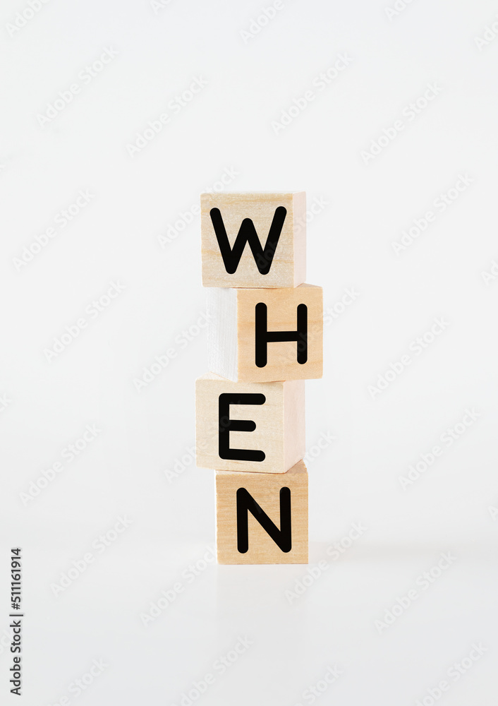 Cubic wooden blocks forming the 'when' text Cubic wooden blocks forming the 'when' text