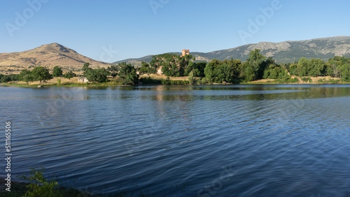 Landscape of the Pontoon reservoir in Segovia on a summer day with clear skies.