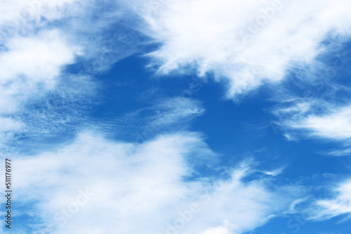 Bright blue sky with white clouds © JANTANA