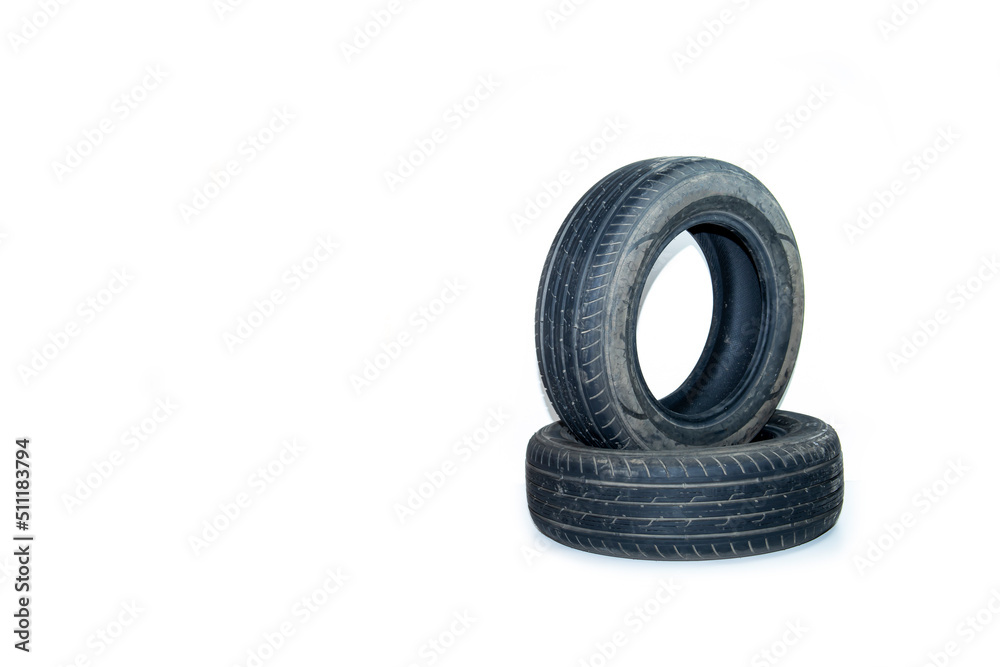 Summer tires on a passenger car on a white background Summer tires on a passenger car on a white background
