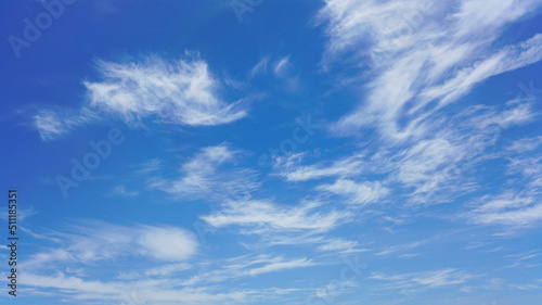 WIspy clouds and blue sky suitable for background use or sky substitution photo