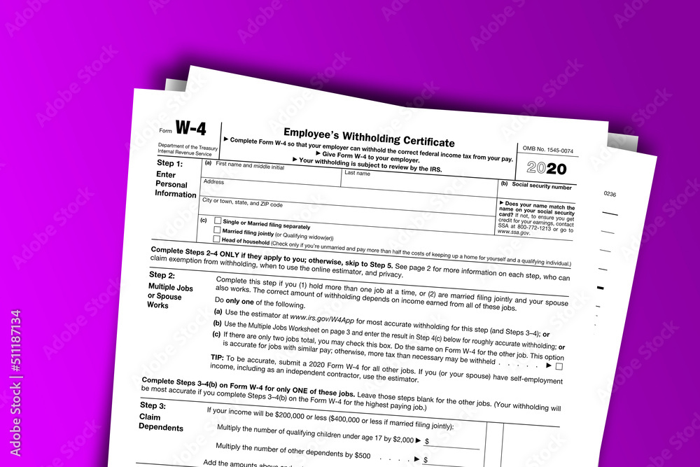 Fototapeta premium Form W-4 documentation published IRS USA 12.31.2020. American tax document on colored