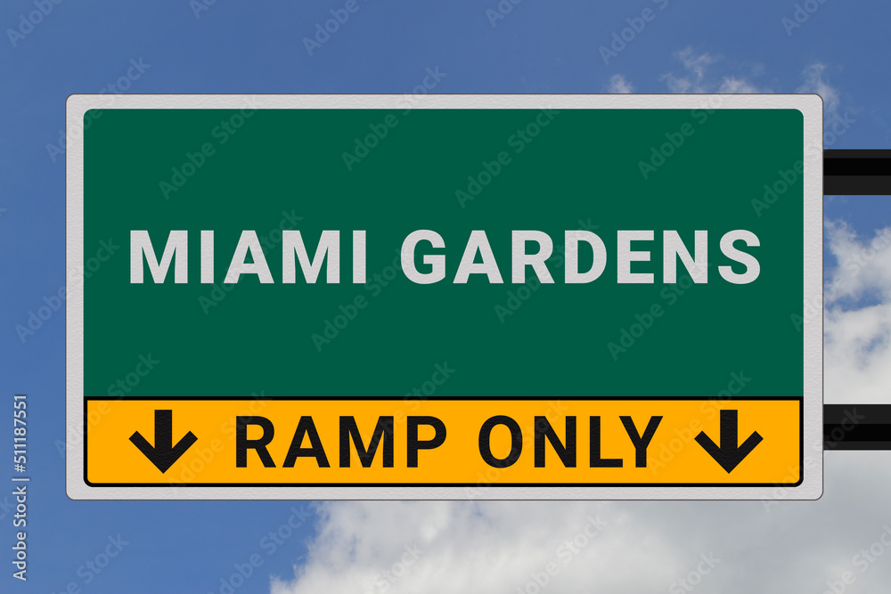 Miami Gardens logo. Miami Gardens lettering on a road sign. Signpost at entrance to Miami Gardens, USA. Green pointer in American style. Road sign in the United States of America. Sky in background Miami Gardens logo. Miami Gardens lettering on a road sign. Signpost at entrance to Miami Gardens, USA. Green pointer in American style. Road sign in the United States of America. Sky in background