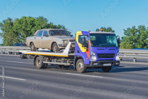 Tow truck for cars transportation.