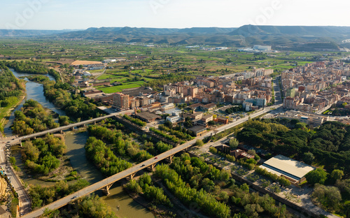 Bird's eye view of Spanish town Fraga. Cinca River visible from above.