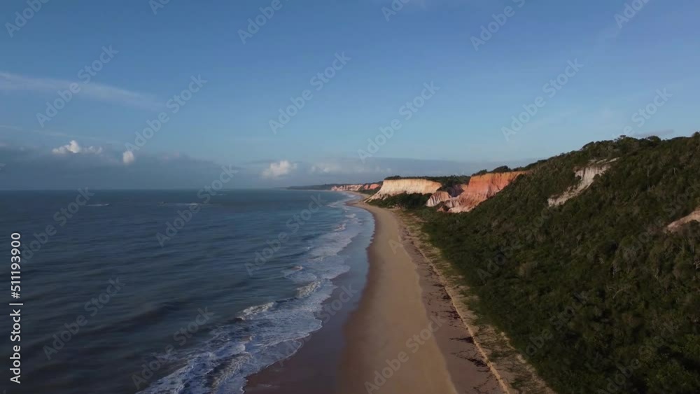Beautiful and high nature cliffs of bahia in front of the beach - aerial Drone View - Arraial D'Ajuda, Porto Seguro, Bahia - Atlantic Forest Beautiful and high nature cliffs of bahia in front of the beach - aerial Drone View - Arraial D'Ajuda, Porto Seguro, Bahia - Atlantic Forest