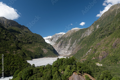 Elevated view from Sentinel Rock looking up the Waiho River valley to the Franz Josef glacier in the Southern Alps, West Coast, South Island, New Zealand. photo